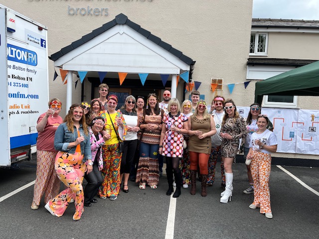 Stanmore team in fancy dress for 60th celebrations